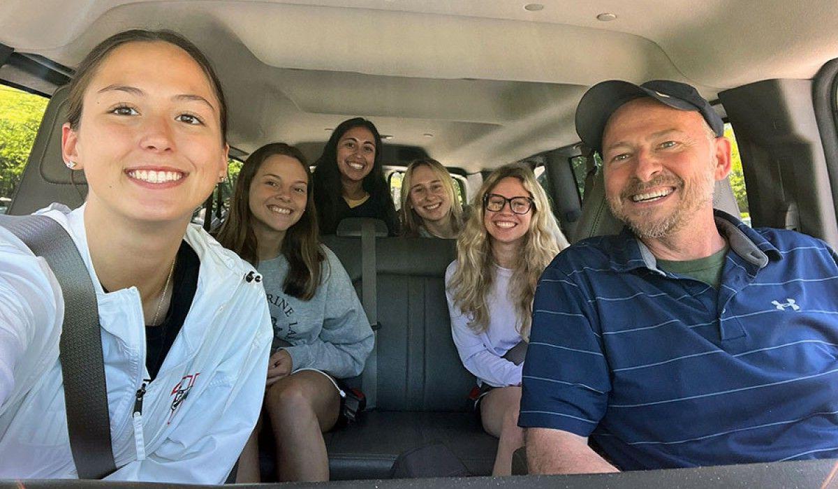 Students in the van as we start our journey