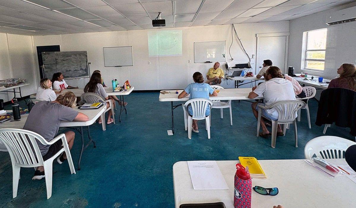 Students taking their exam in our classroom