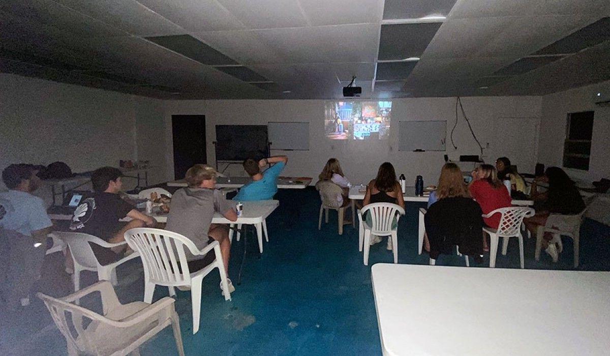 Students watching a movie in the classroom