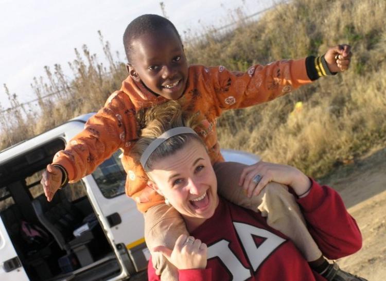 Student with Orphan on Shoulders